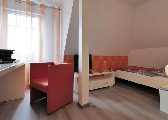 Elena Kempf Haaratelier & Hotel *